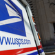 A postal vehicles sits in front of a United State Postal Service facility on Aug. 13 in Chicago, Ill. President Donald Trump said today that he opposes additional funding for the Postal Service because the lack of additional funding would make it more difficult to deliver mail-in ballots.